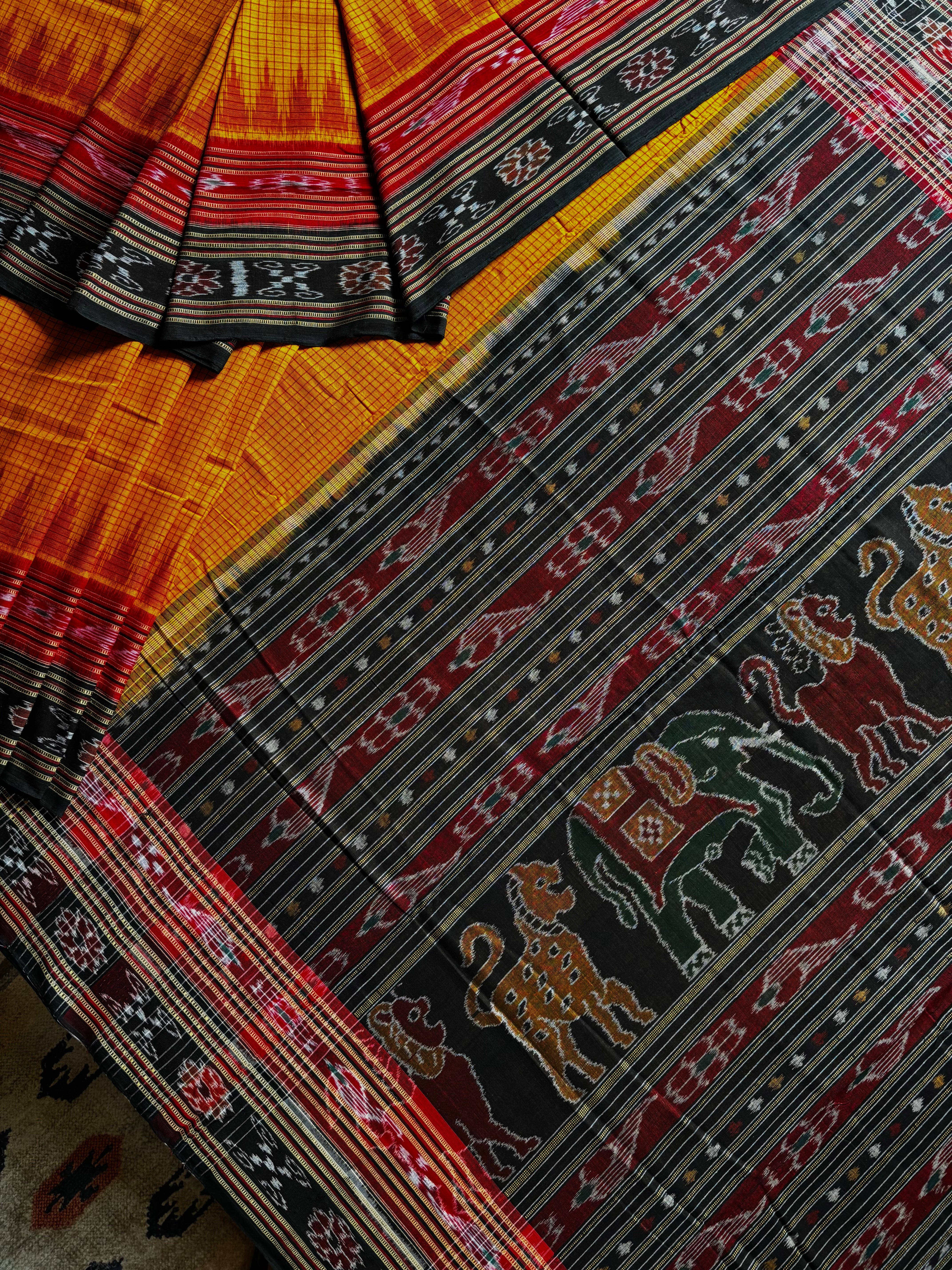 Handwoven Orangish Yellow Colour Cotton Sachipar Odisha Ikkat Saree