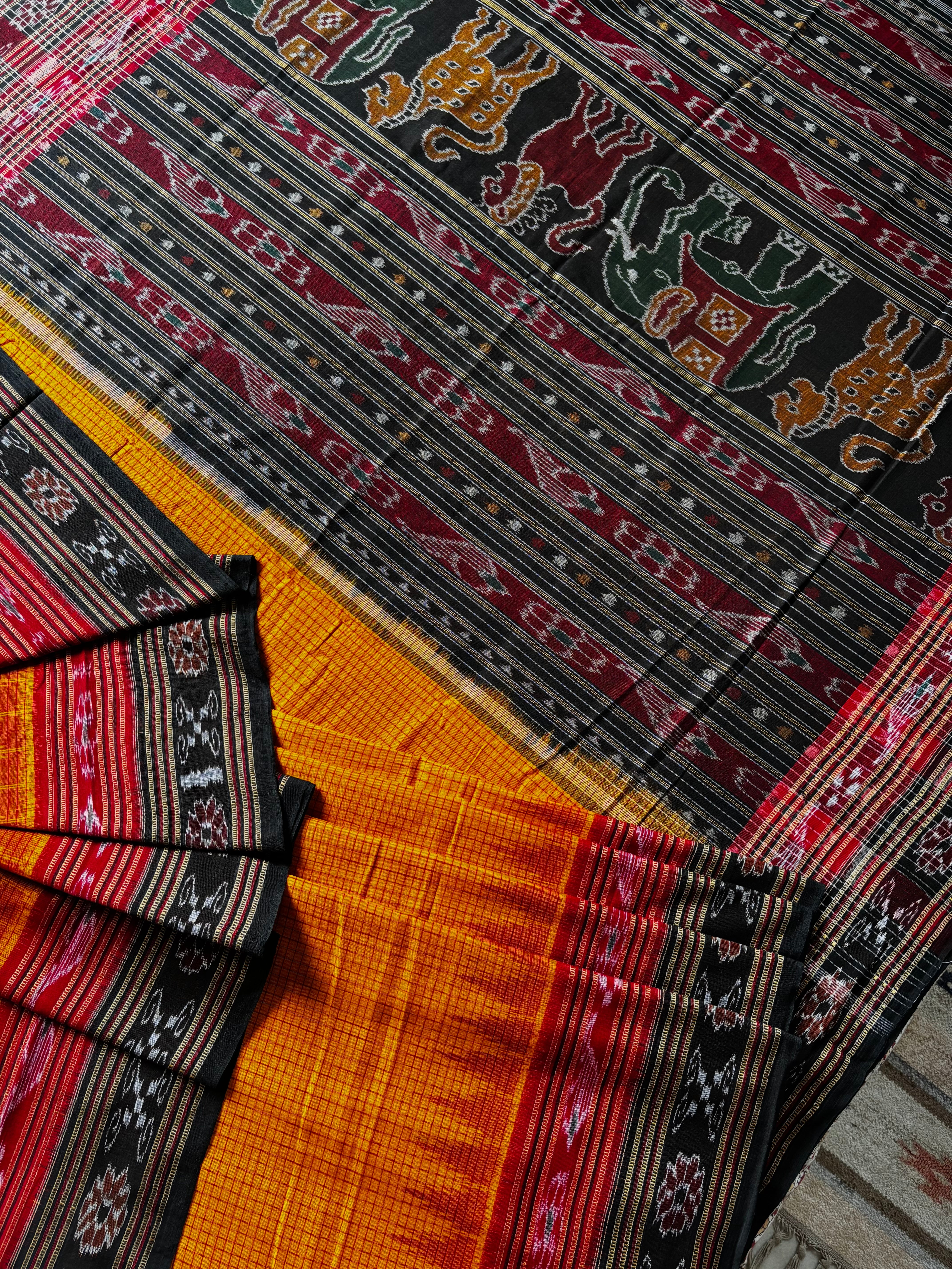 Handwoven Orangish Yellow Colour Cotton Sachipar Odisha Ikkat Saree