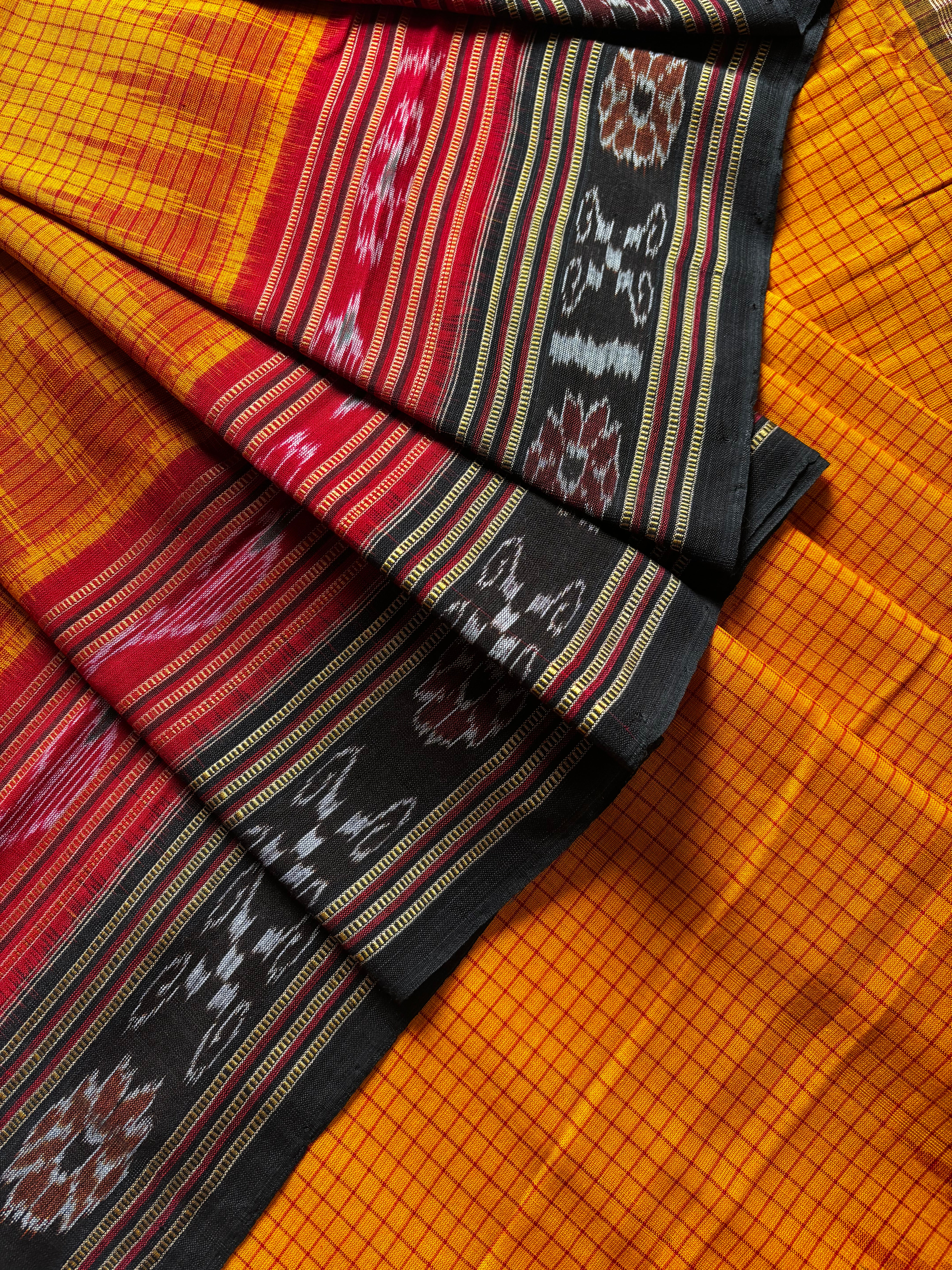 Handwoven Orangish Yellow Colour Cotton Sachipar Odisha Ikkat Saree