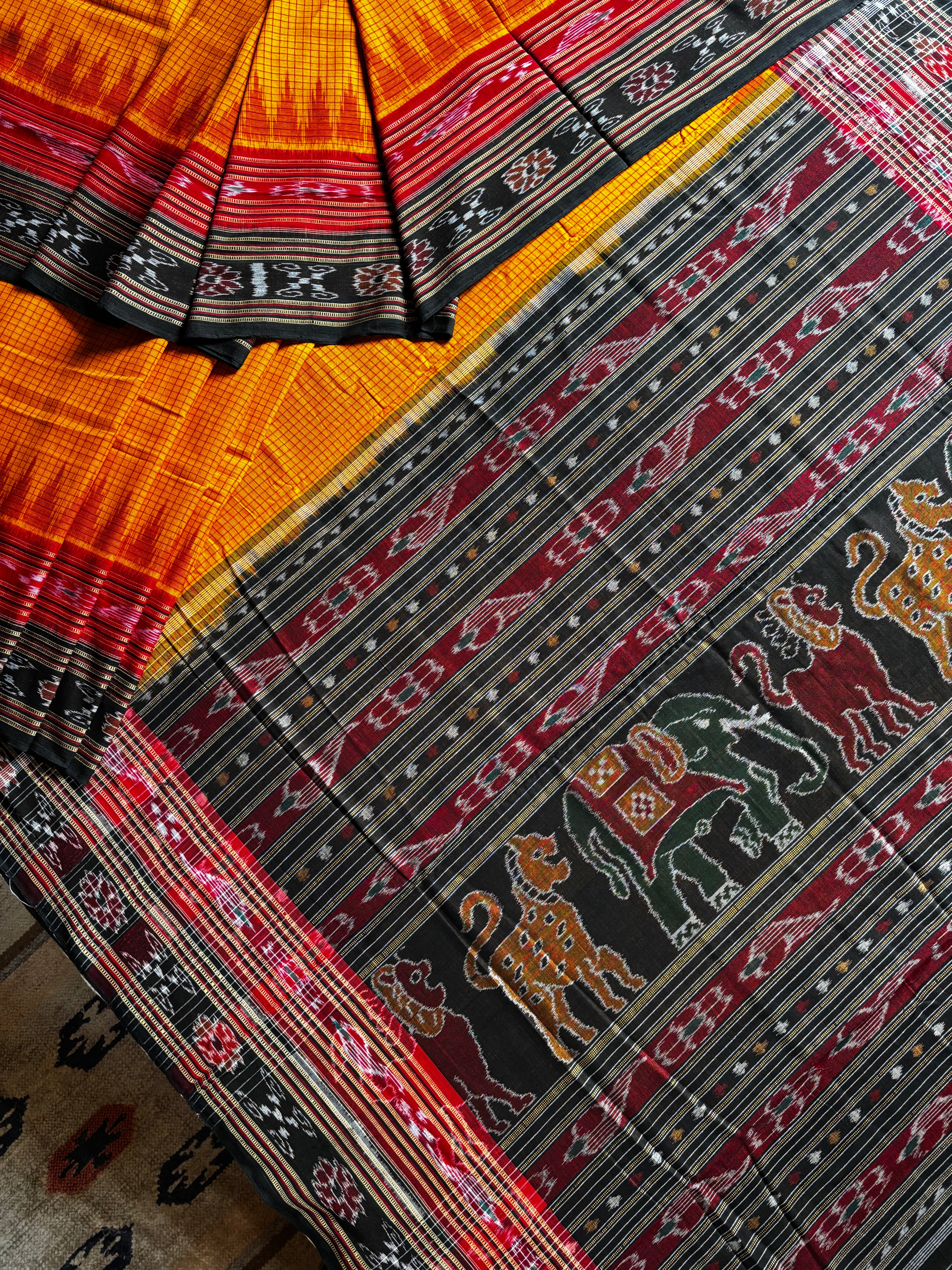 Handwoven Orangish Yellow Colour Cotton Sachipar Odisha Ikkat Saree