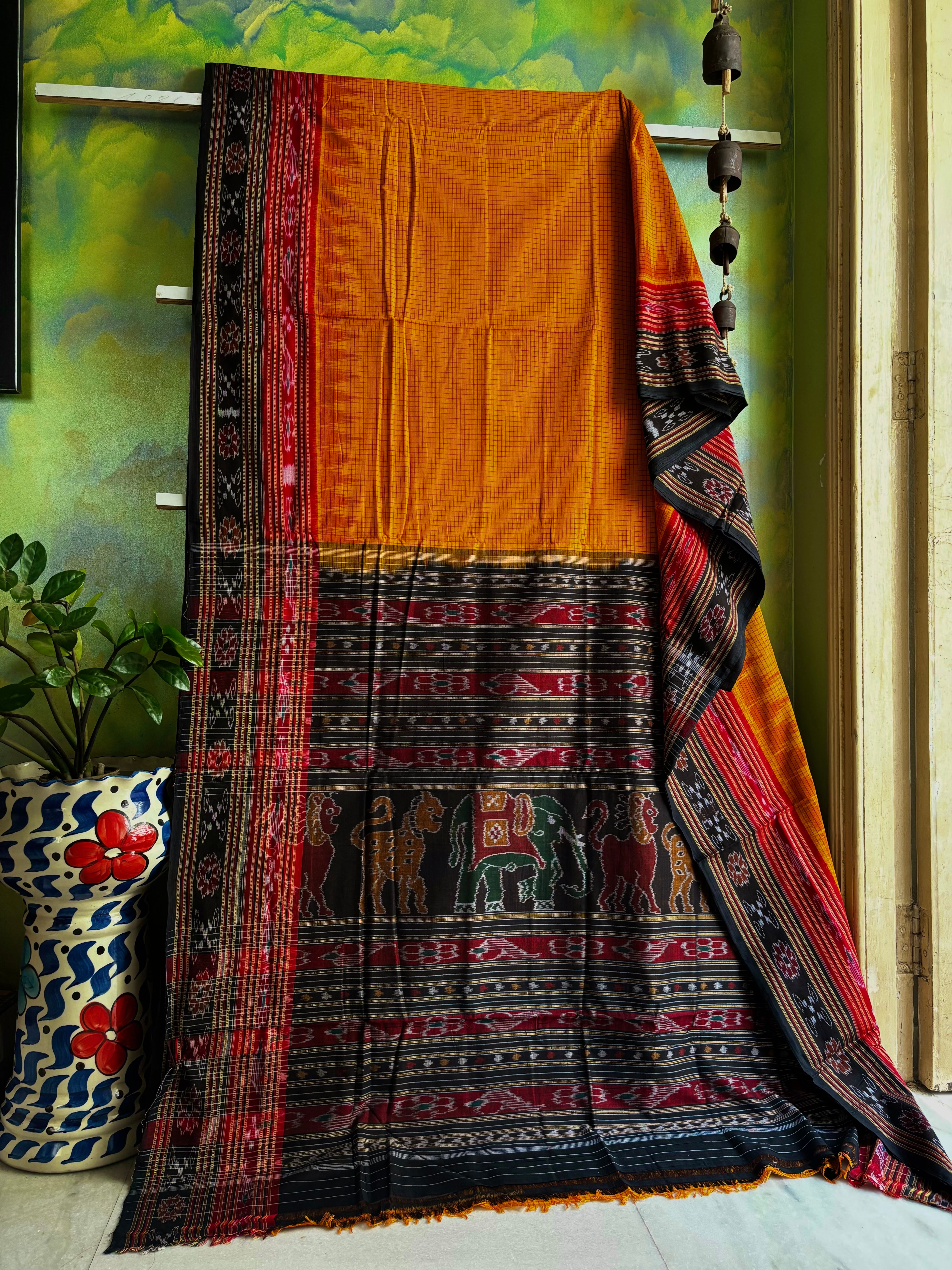 Handwoven Orangish Yellow Colour Cotton Sachipar Odisha Ikkat Saree