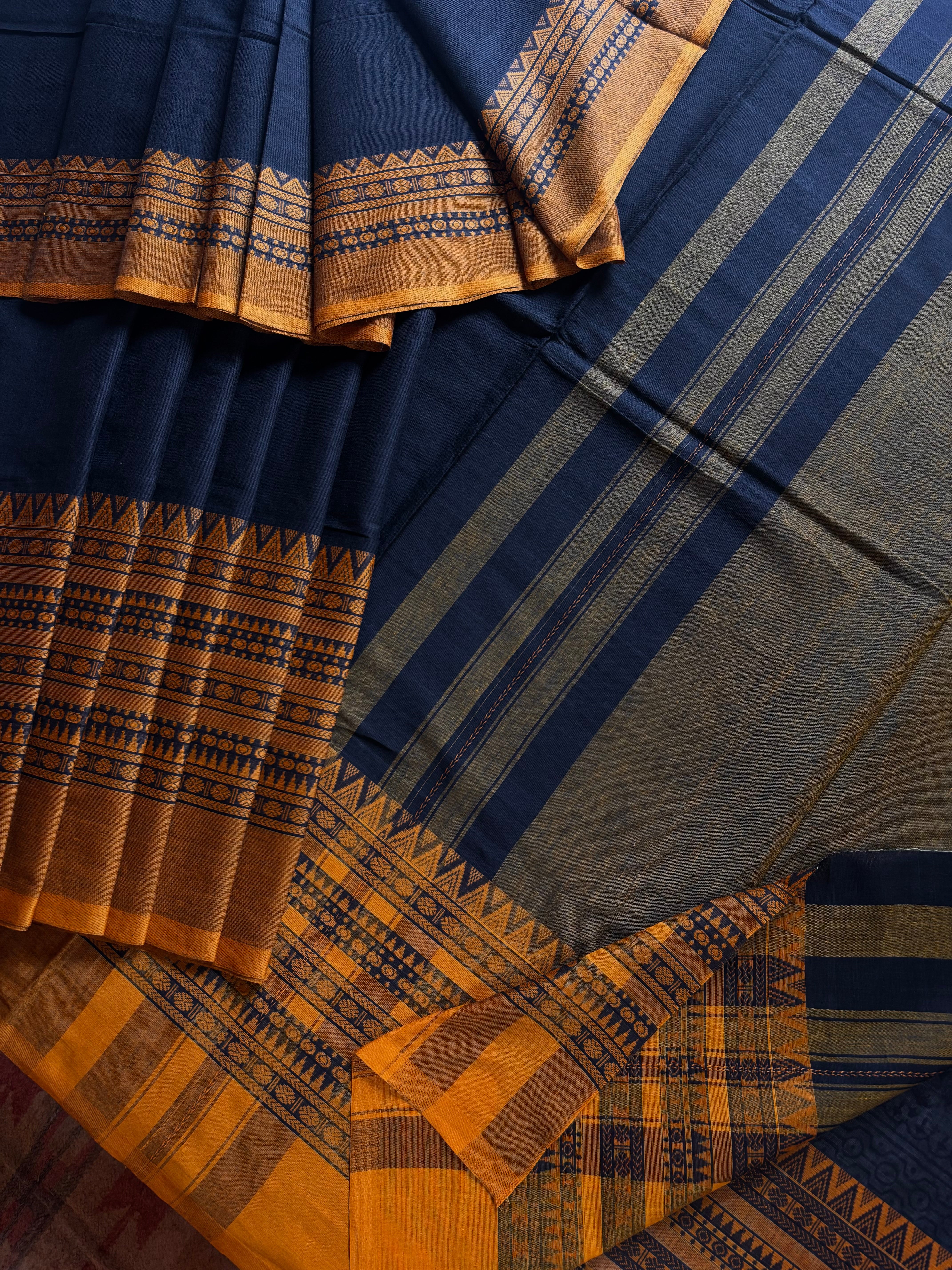 Handwoven Black Orangish Yellow Cotton Dhonekhali Saree